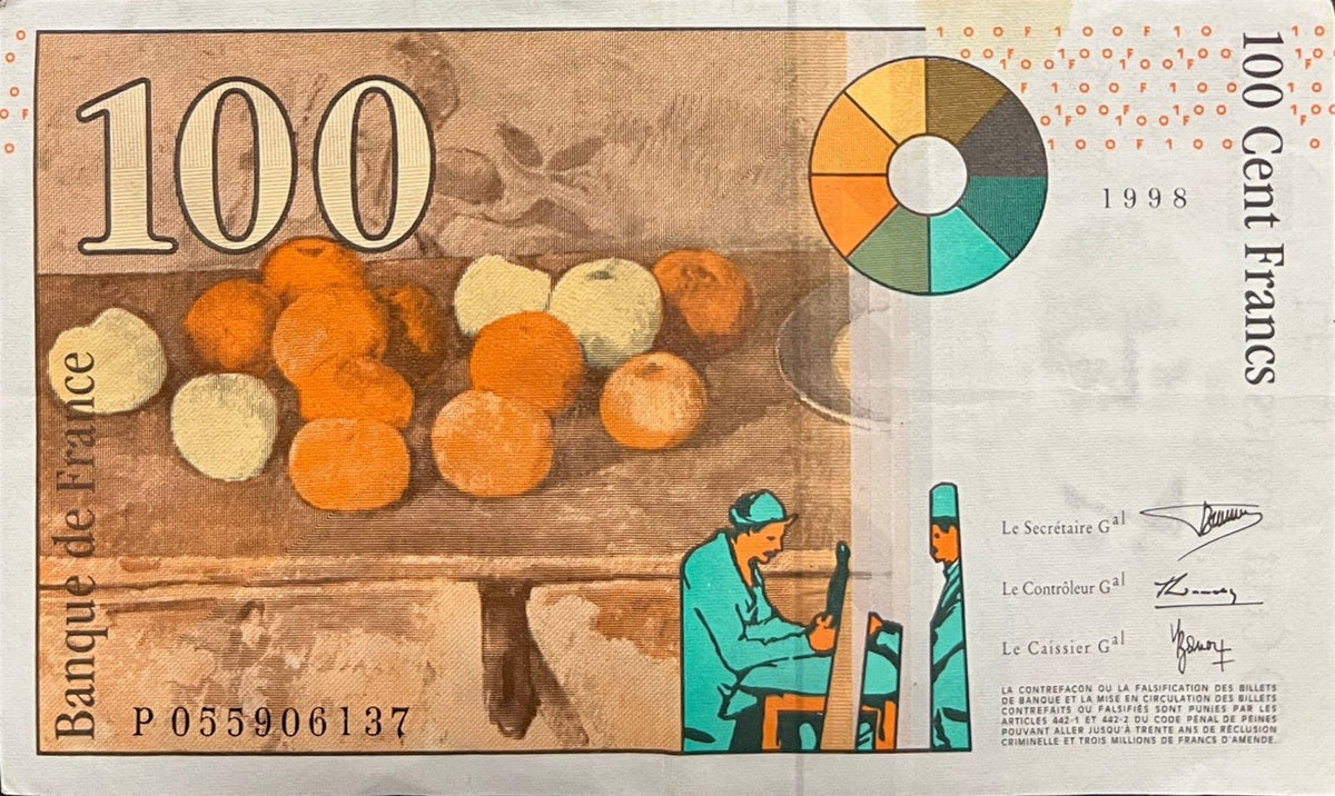 Back view of a 1998 France 100 Francs banknote showing Cézanne's still life of apples and biscuits and a colour wheel.