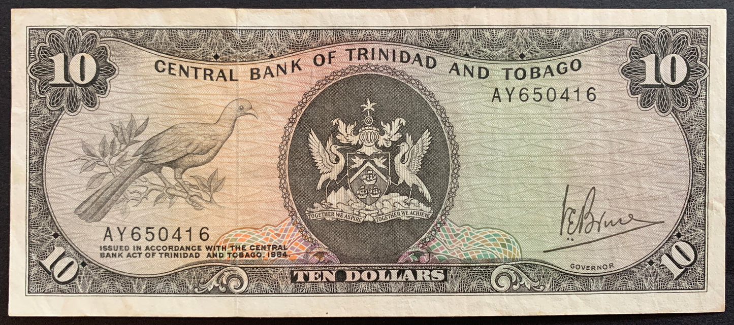 Trinidad and Tobago 10 Dollars ND (1977) P-32 VF vintage banknote face with cocrico bird and coat of arms