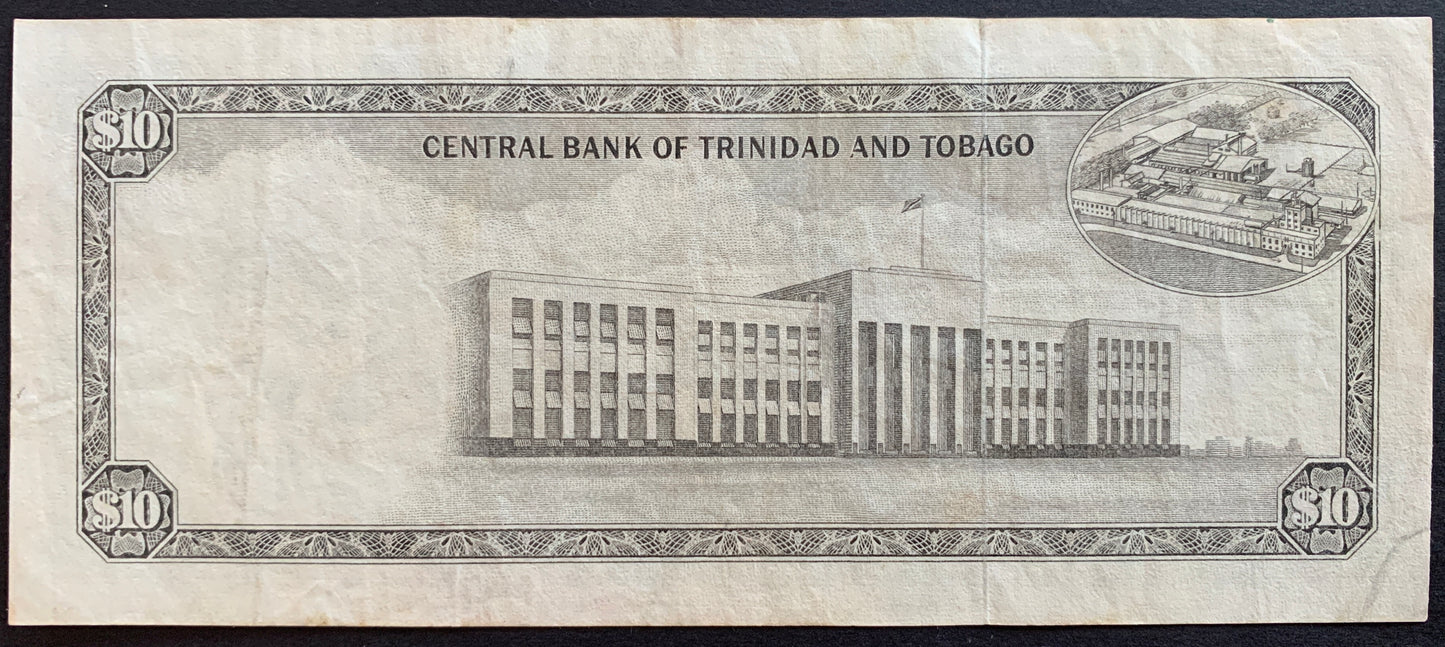Trinidad and Tobago 10 Dollars ND (1977) P-32 VF vintage banknote back with treasury building and sugar cane processing plant