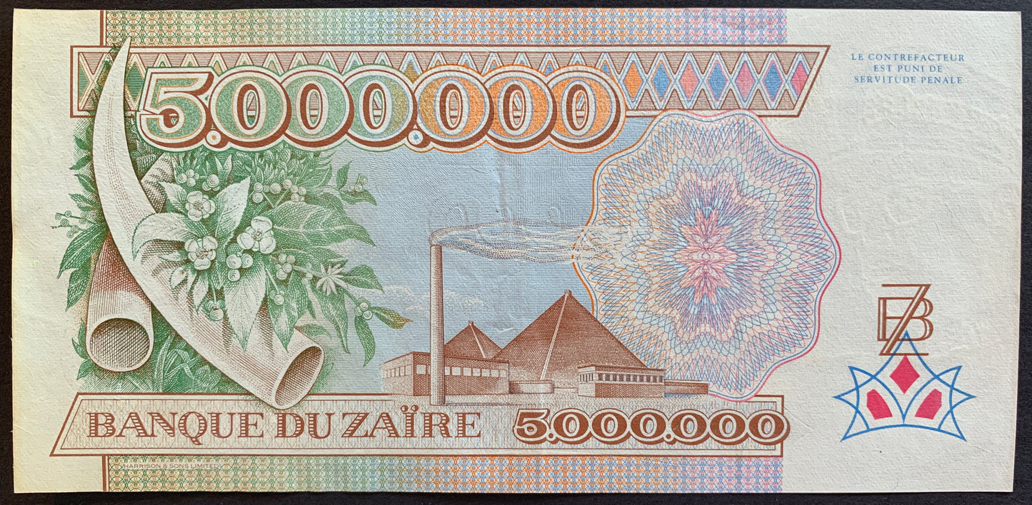 Zaïre 5 million zaïres 1992 P-46 banknote with elephant tusks, flora, factory, and pyramids