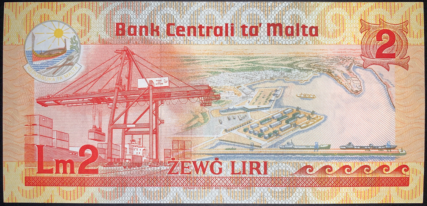 Malta 2 Liri banknote ND (1986) P-37 reverse depicting the Malta Freeport container terminal with cargo cranes, shipping containers, harbor facilities, and an aerial view of the port. Detailed multicolor design celebrating Malta's maritime commerce and economic development.