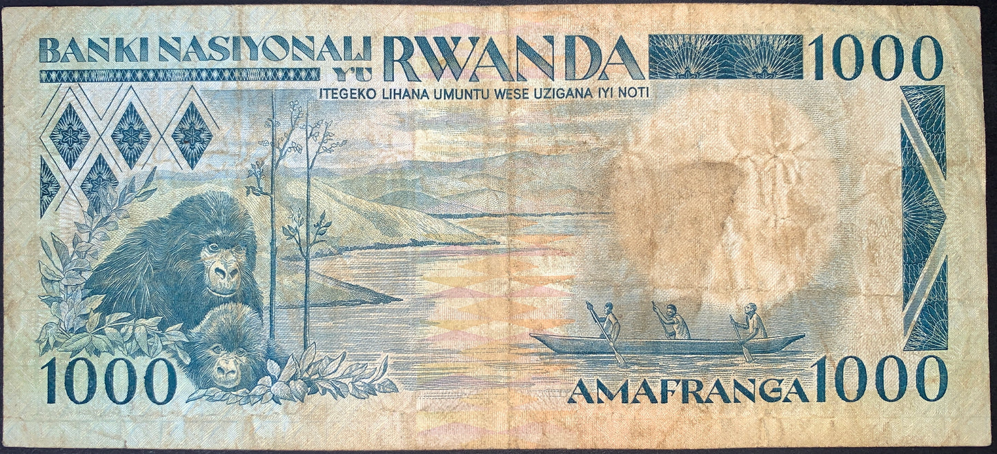 back of Rwanda 1000 Francs 1981 P-17 F collectible vintage banknote with gorillas and fishermen in boat