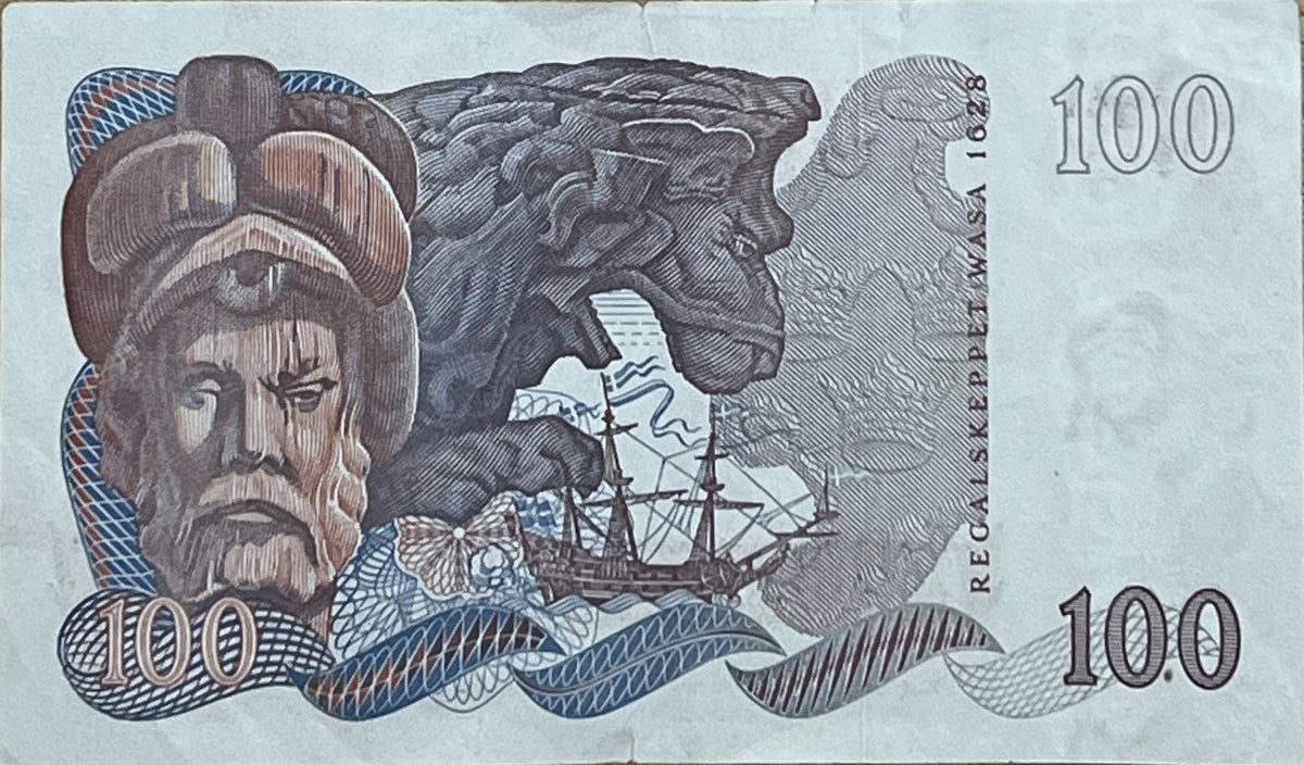 Back view of a Sweden 100 Kronor banknote showing the royal warship Vasa of 1628 with carvings of a bearded console head and the lion figurehead.