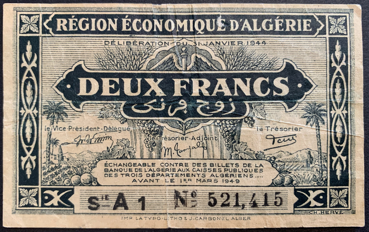 front of Algeria 2 Francs 1944 P-99a collectible vintage banknote with floral frame; country scene represented by palm trees, fruits, a sheaf of wheat, an agricultural field and a village in the distance