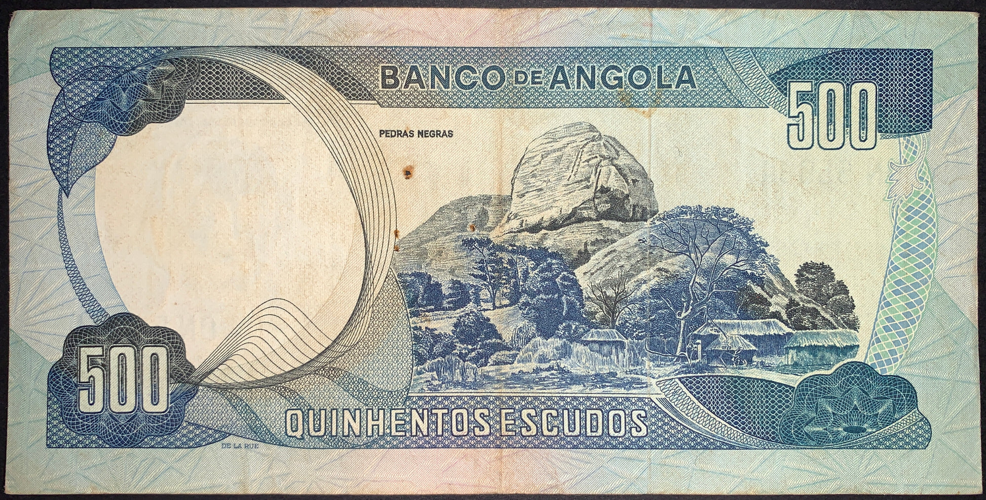 back of Angola 500 Escudos 1972 P-102 VF collectible vintage banknote with  landscape of Pedras de Pungo Andongo
