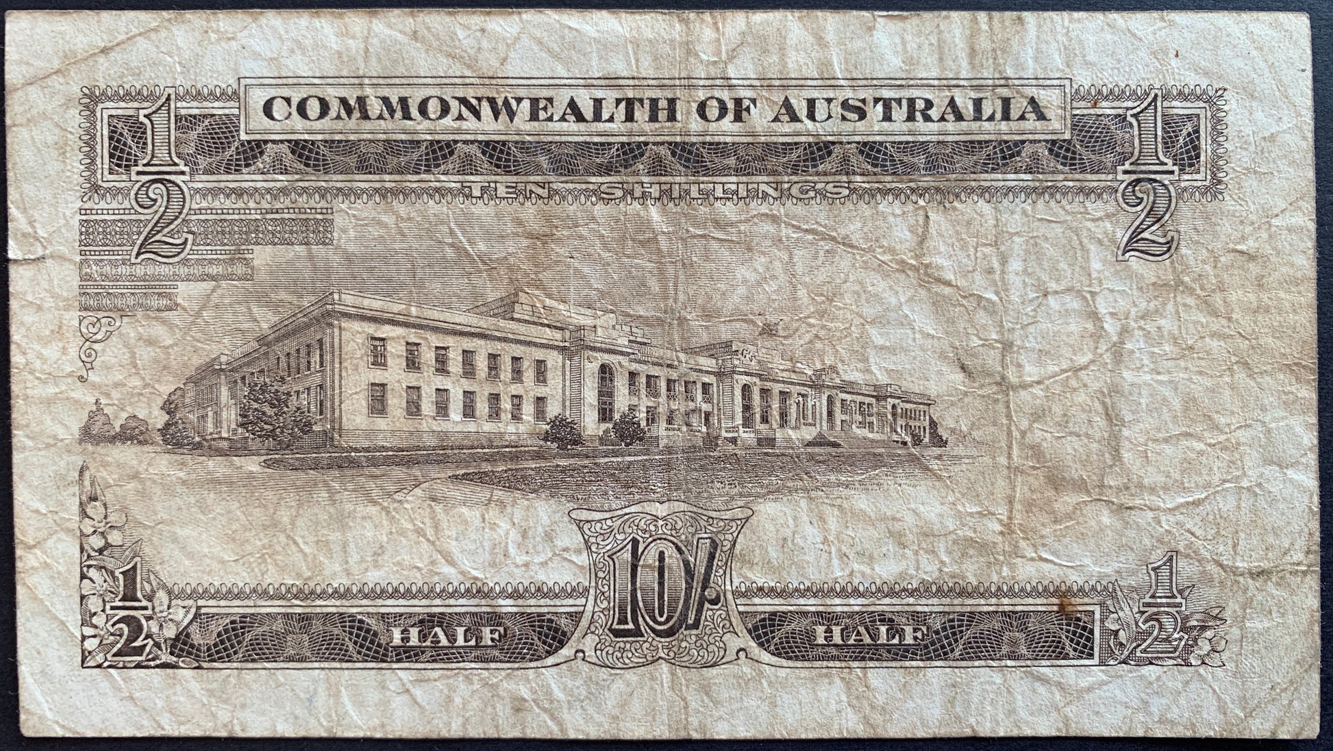 back of Australia 10 Shillings "Commonwealth" ND (1954-1960) P-29a F collectible vintage banknote with building of Parliament House in Cenberra