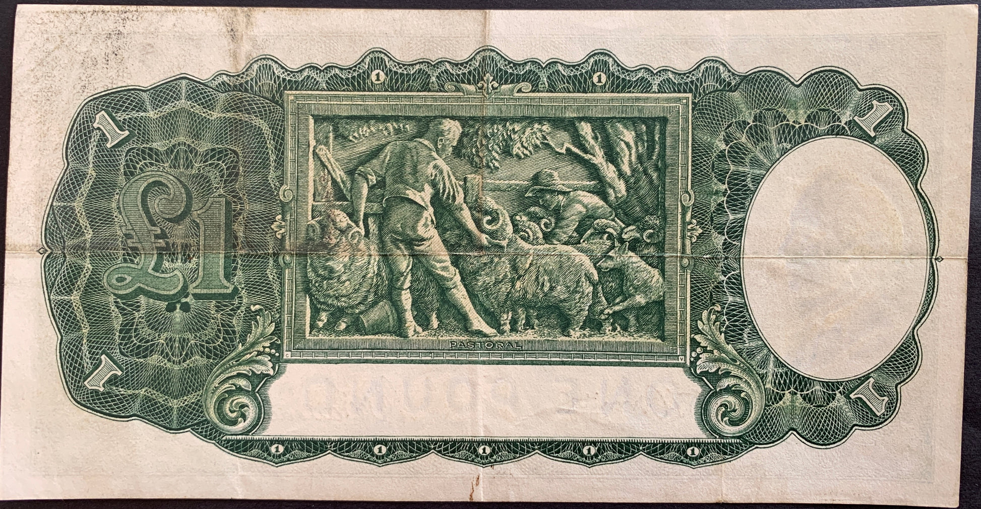 back of Australia 1 Pound ND (1941-1948) P-26b VF collectible banknote with Scene of sheep farming representing "Pastoral"