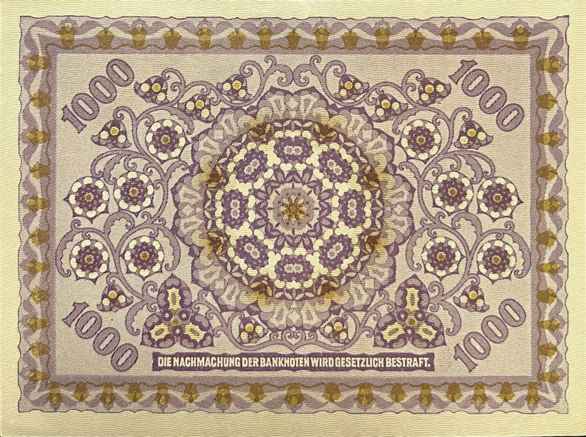 Back view of a 1922 Austria 1000 Kronen banknote showing a large ornamental floral rosette.