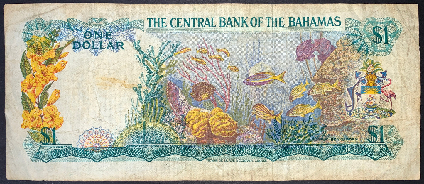 back of Bahamas 1 Dollar 1974 P-35a F/VF collectible vintage banknote with coral reef and fish