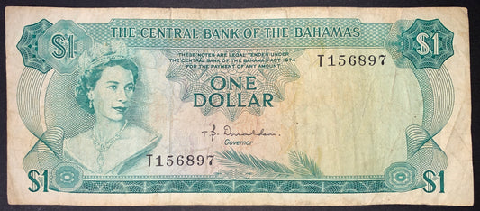 front of Bahamas 1 Dollar 1974 P-35a F/VF collectible vintage banknote with portrait of Queen Elizabeth II