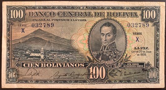front of Bolivia 100 Bolivianos 1928 P-133 VF collectible vintage banknote with portrait of Simón Bolívar and Potosí in background