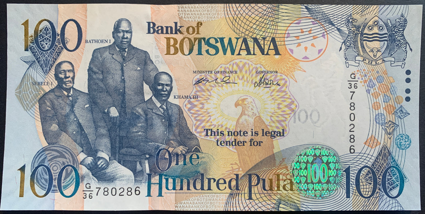 front of Botswana 100 Pula 2005 P-29b UNC collectible banknote with fish eagle and the three chiefs Sebele I, Bathoen I, Khama III
