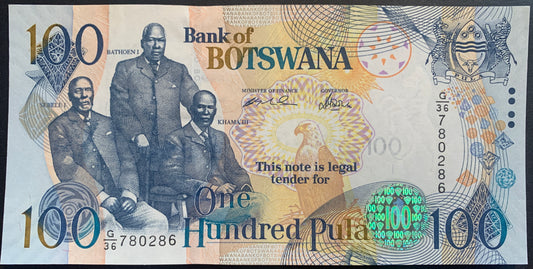 front of Botswana 100 Pula 2005 P-29b UNC collectible banknote with fish eagle and the three chiefs Sebele I, Bathoen I, Khama III