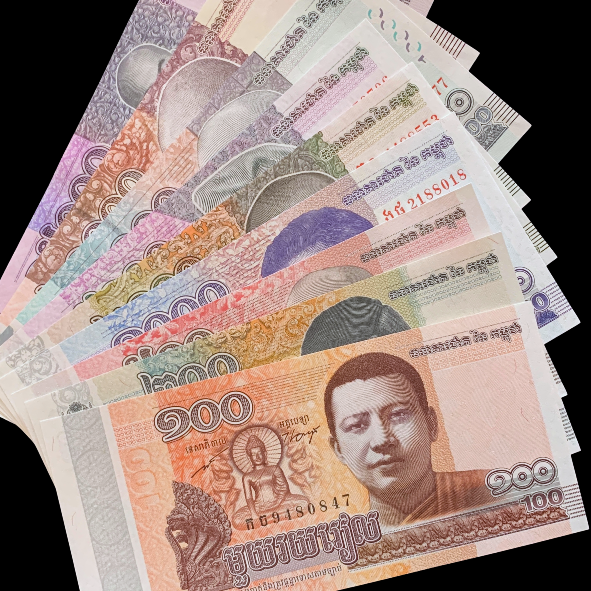 Stack of Cambodian currency notes with a clear background