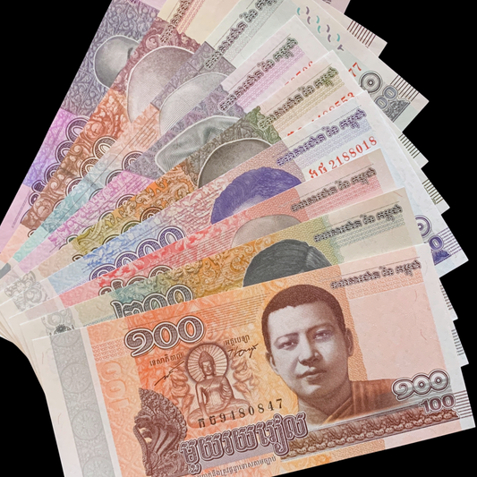 Stack of Cambodian currency notes with a clear background