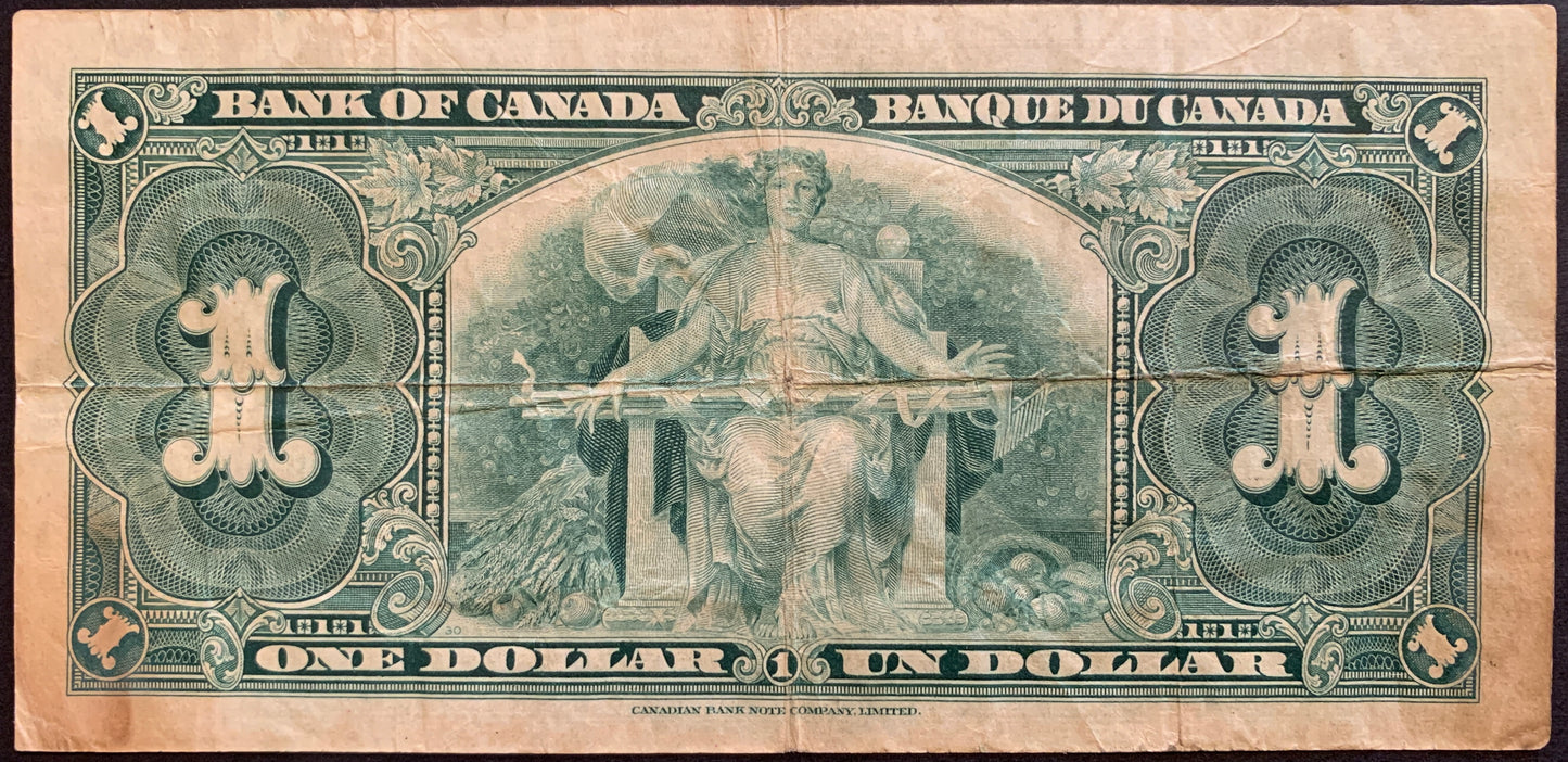back of Canada 1 Dollar 1937 P-58d F collectible banknote with allegory of Agriculture