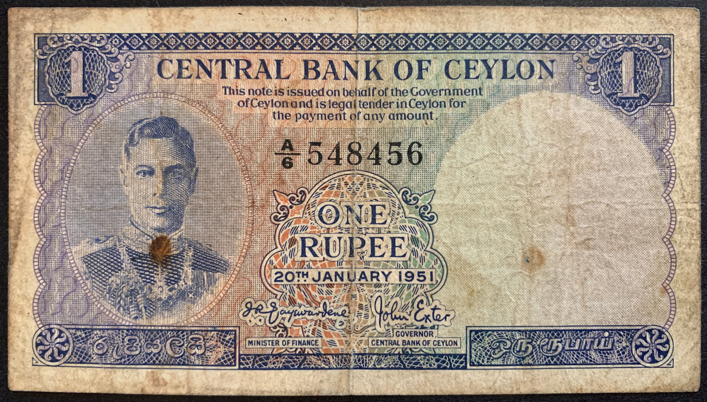 front of Ceylon (Sri Lanka) 1 Rupee 1951 P-47 F+ collectible banknote with portrait of King George VI