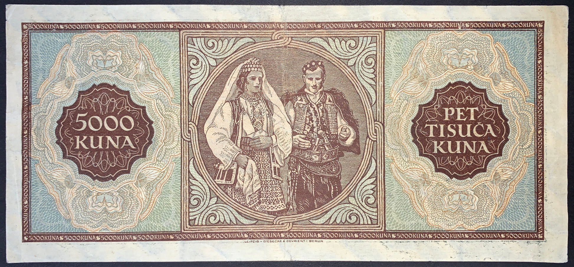 back of Croatia 5000 Kuna 1943 P-13 F collectible vintage banknote with traditional couple