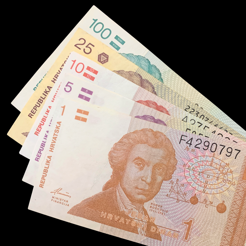 BUndle of croatian Dinar banknotes on black background