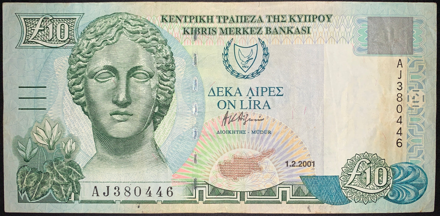 front of Cyprus 10 Pounds 2001 P-62c F collectible banknote with cyclamen, map of cyprus, and bust of Artemis