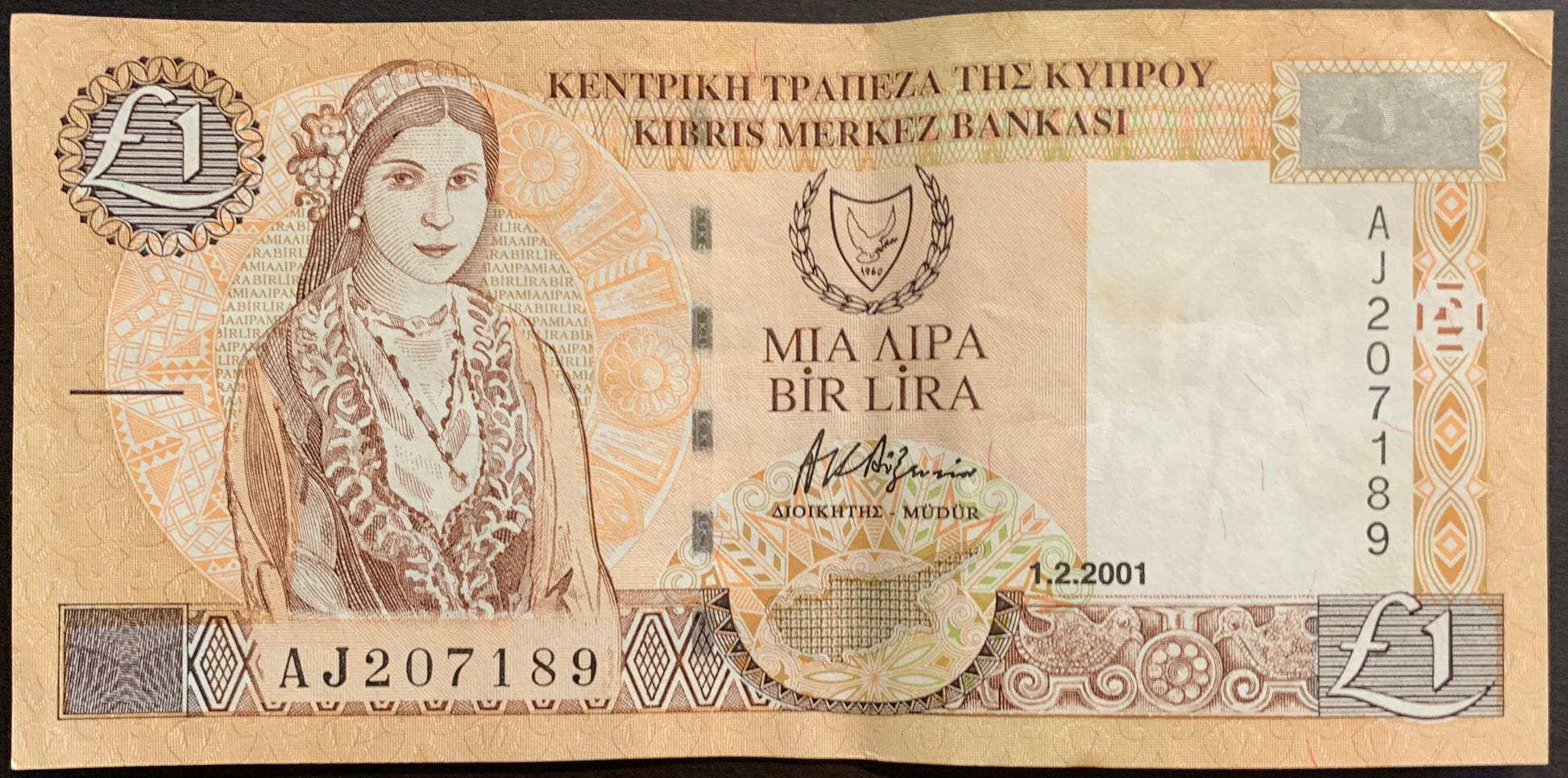 Cyprus 1 Pound 2001 P-60c banknote front in Very Fine condition with woman