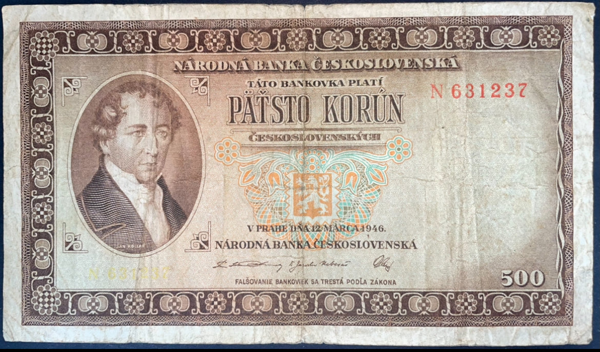 Obverse of a Czechoslovakia 500 Korun 1946 banknote, featuring a portrait, the Czechoslovak coat of arms, ornate floral decoration, serial number, and 500 Korun denomination.