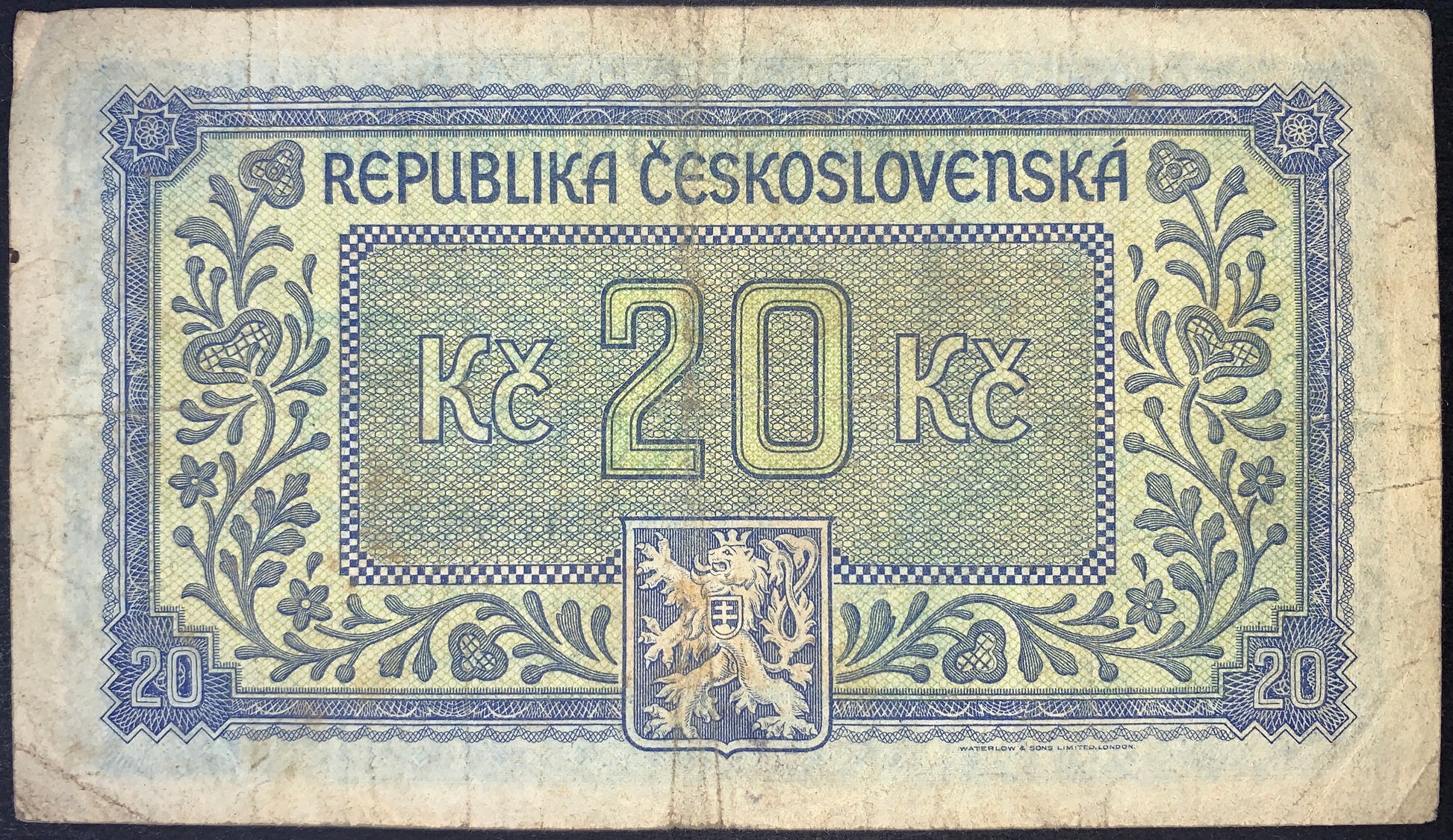 back of Czechoslovakia 20 Korun ND (1945) P-61 F/VF collectible vintage european banknote with national coat of arms and floral ornamental frame