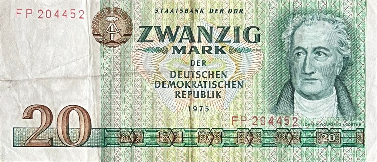 Front view of a very fine 1975 East Germany 20 Mark banknote featuring a portrait of Johann Wolfgang von Goethe and the GDR state emblem.