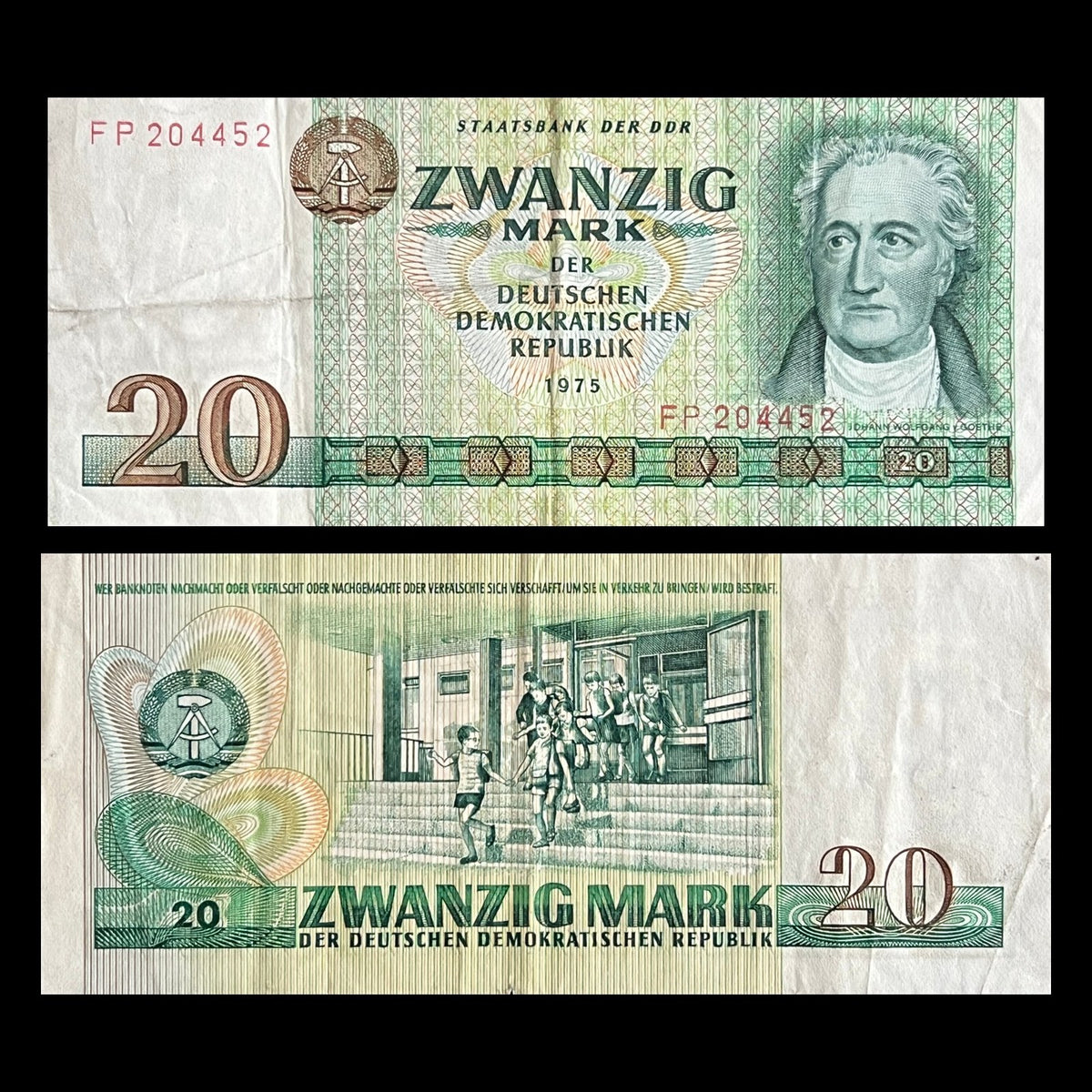 East Germany (GDR) 20 Mark 1975 P-29a VF banknote – front with Johann Wolfgang von Goethe, back with children leaving a school