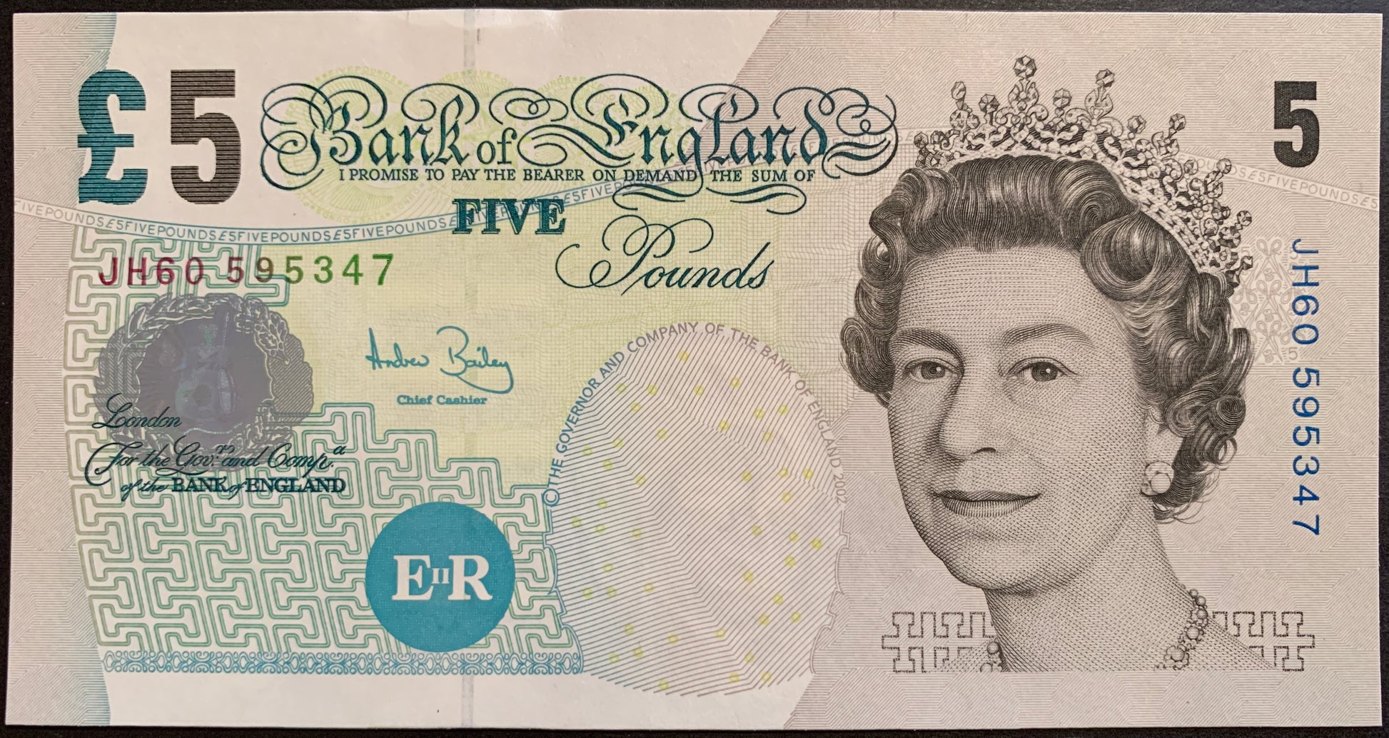 front of England 5 Pounds ND (2004-2011) P-391c UNC collectible banknote with portrait of Queen Elizabeth II