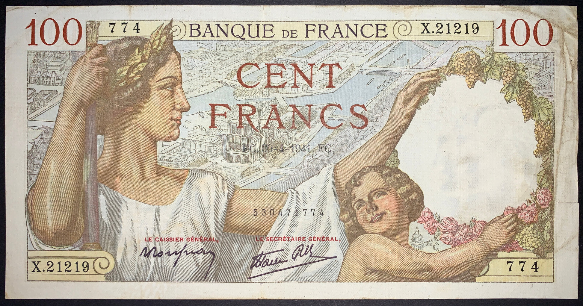 front of France 100 Francs 1941 P-94 F collectible vintage banknote with laurel-crowned woman symbolizing France and child holding a floral medallion framed by grapes