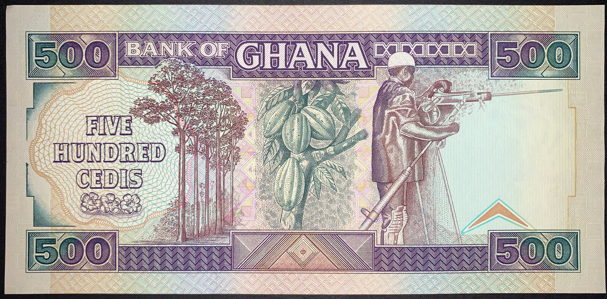 back of Ghana 500 Cedis 1990 P-28b AUNC collectible vintage banknote with cocoa beans and miner