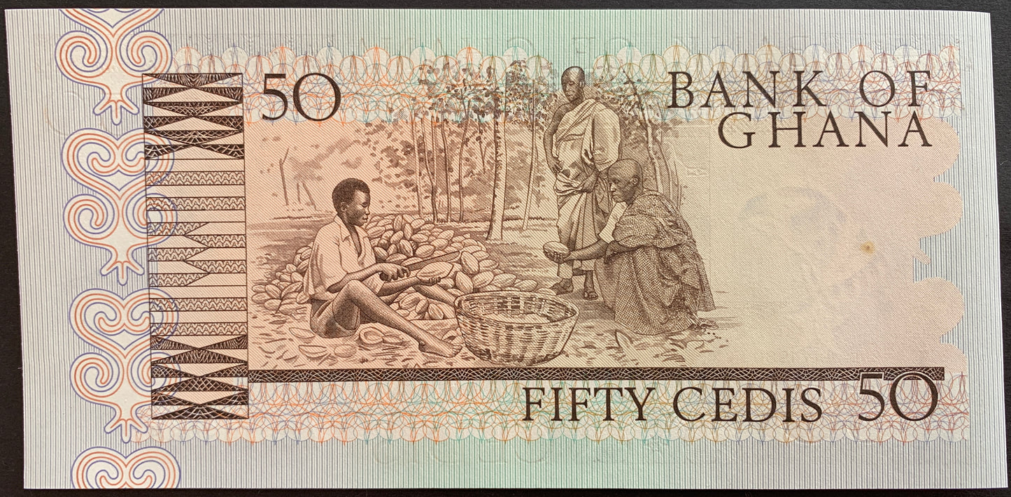 back of Ghana 50 Cedis 1980 P-22b collectible banknote with men splitting cacao pods