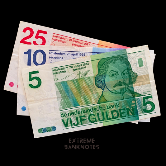 5, 10, 25 Gulden banknote bundle from The Netherlands on black background