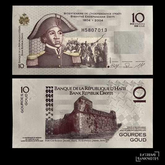 Haiti 10 Gourdes 2018 P-272 UNC banknote – front with Sanité Bélair and a revolutionary battle scene, back with Fort Cap-Rouge in Jacmel