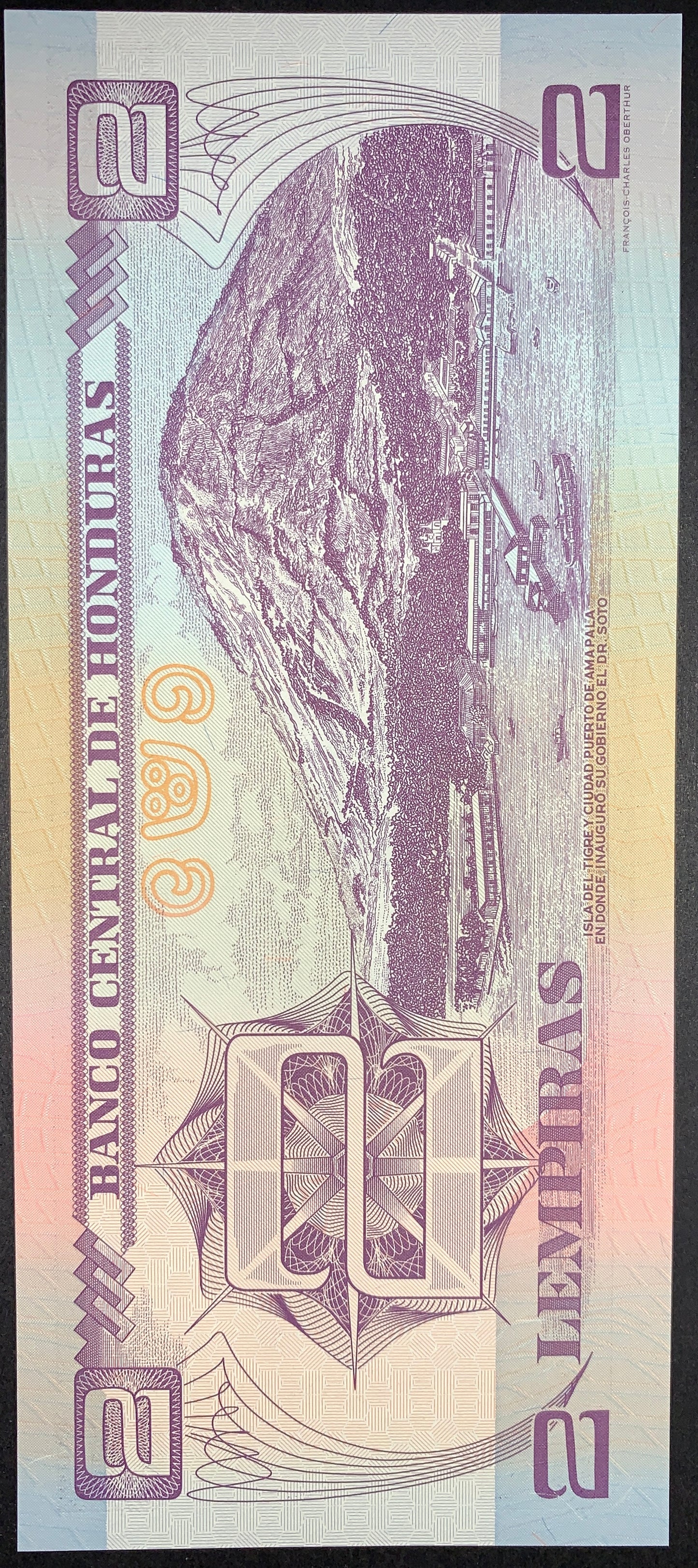 Reverse of an authentic Honduras 2 Lempiras banknote, 2006 issue, Pick P-80Af. Depicts Isla del Tigre overlooking the historic port of Amapala, with detailed engraved artwork, colorful security features, and the denomination prominently displayed.