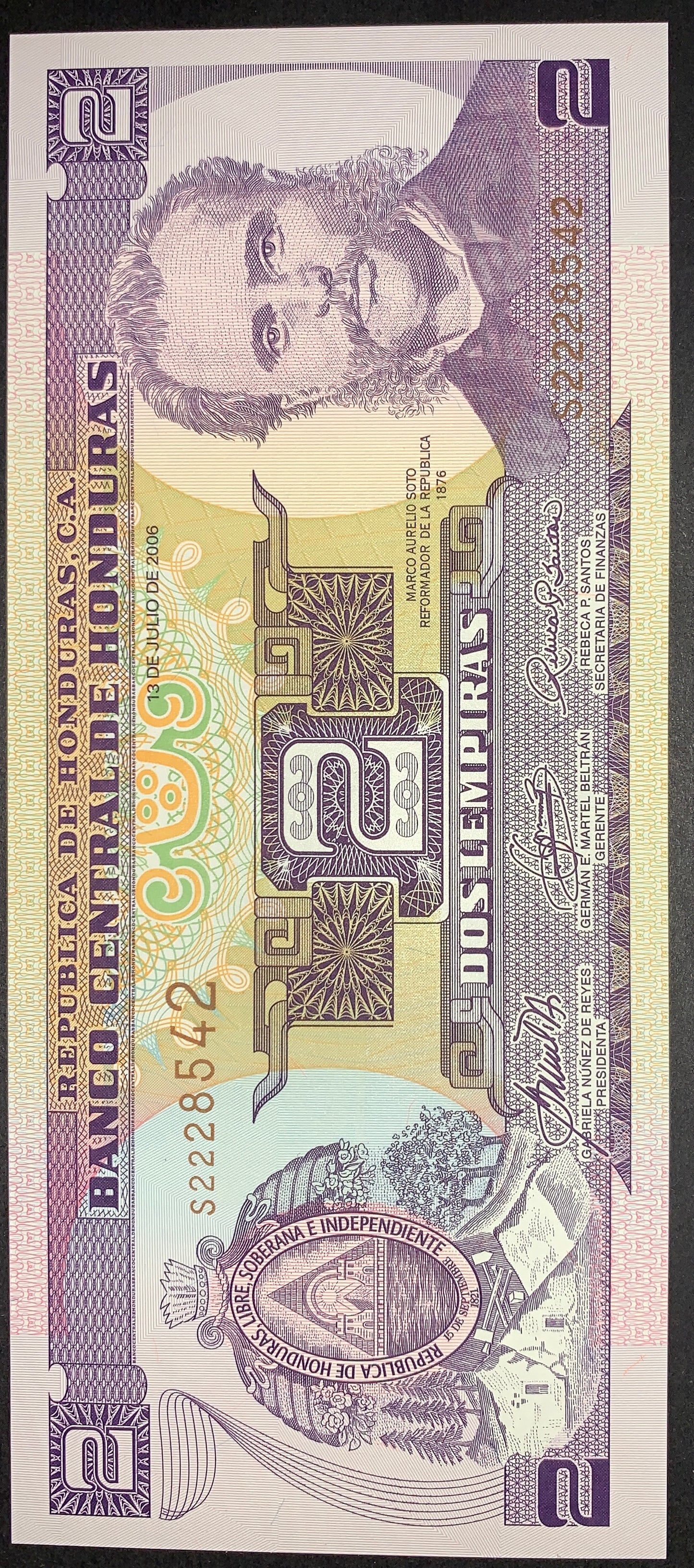 Obverse of an authentic Honduras 2 Lempiras banknote, 2006 issue, Pick P-80Af. Features the portrait of President Marco Aurelio Soto, the Honduran coat of arms, intricate security patterns, and vibrant multicolor printing in UNC condition.