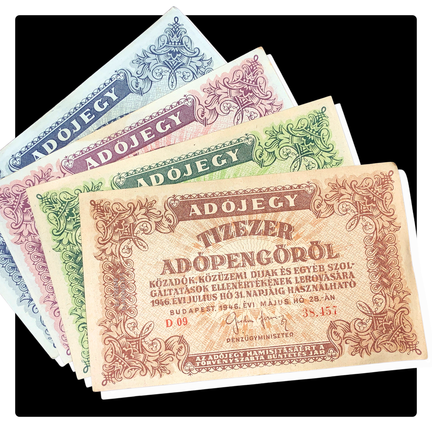 bundle of hungarian hyperinflationary banknotes on black background