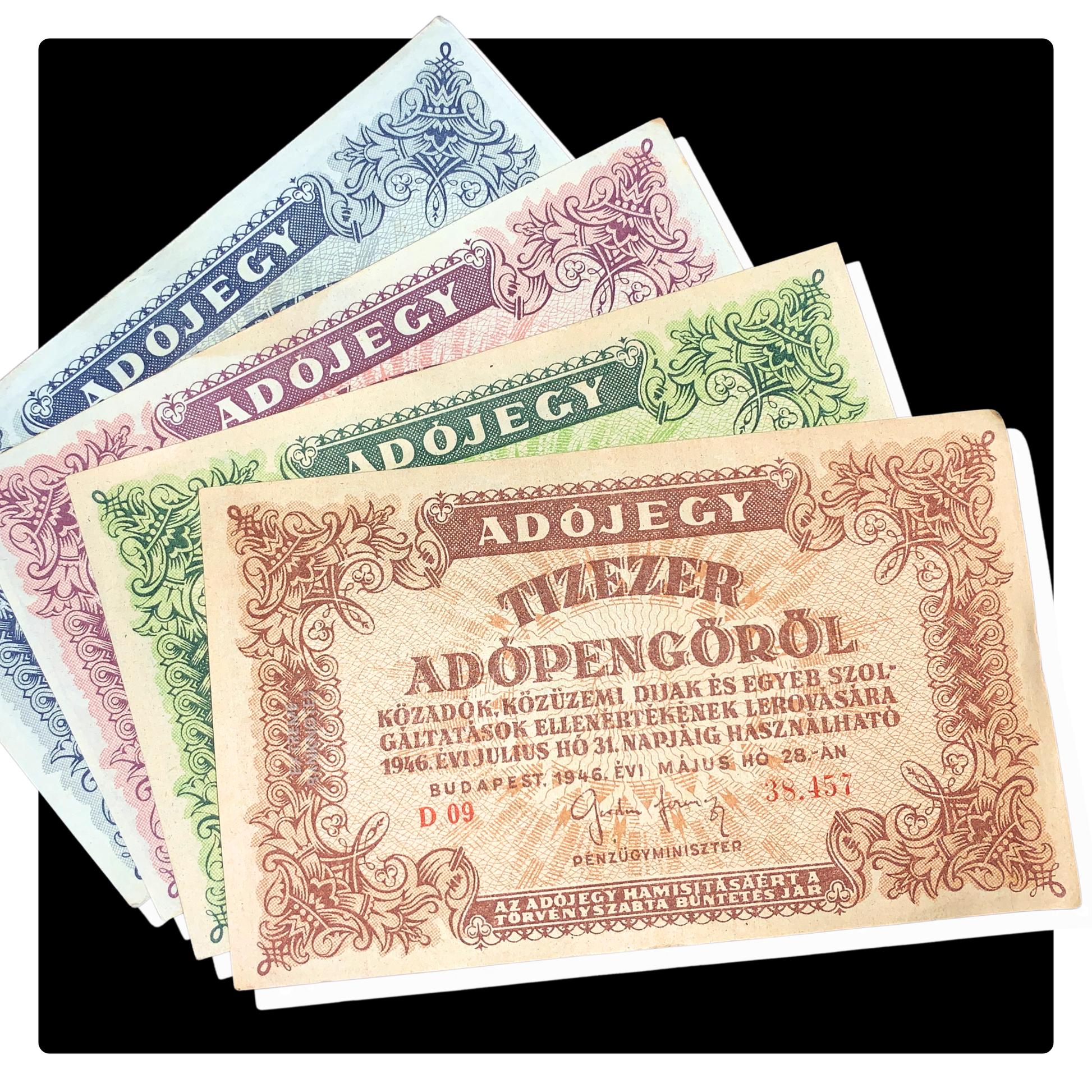 bundle of hungarian hyperinflationary banknotes on black background