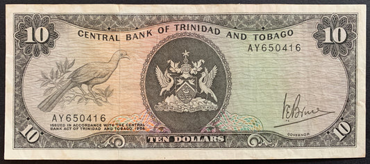 Trinidad and Tobago 10 Dollars ND (1977) P-32 VF vintage banknote face with cocrico bird and coat of arms