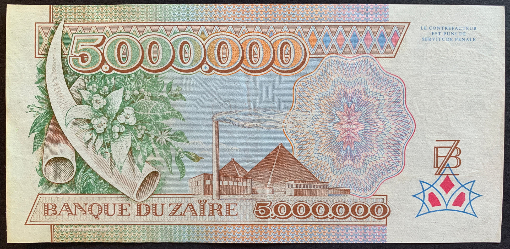 Zaïre 5 million zaïres 1992 P-46 banknote with elephant tusks, flora, factory, and pyramids