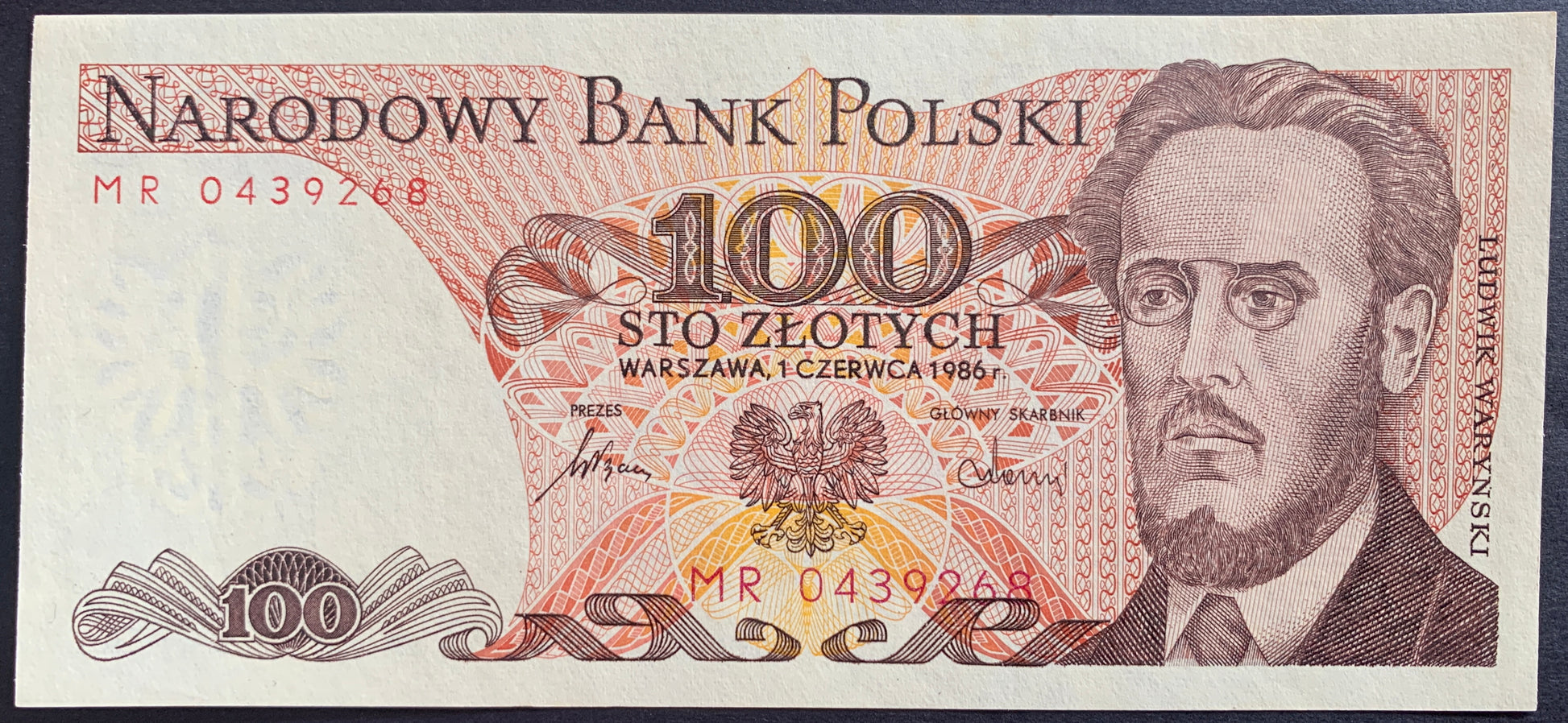 Poland 100 Zlotys 1986 P-143e.1 Polish banknote with a portrait and national emblem, featuring 'Narodowy Bank Polski' text.