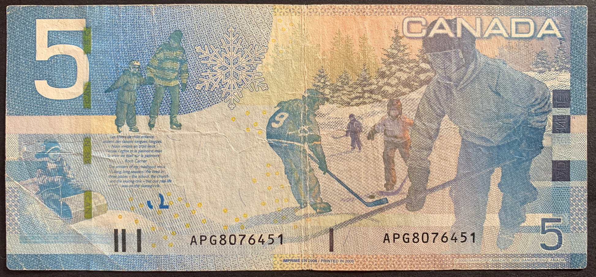 Canada 5 Dollars 2006 P-101Aa banknote bill with winter sports: hockey, tobogganing, and ice skating