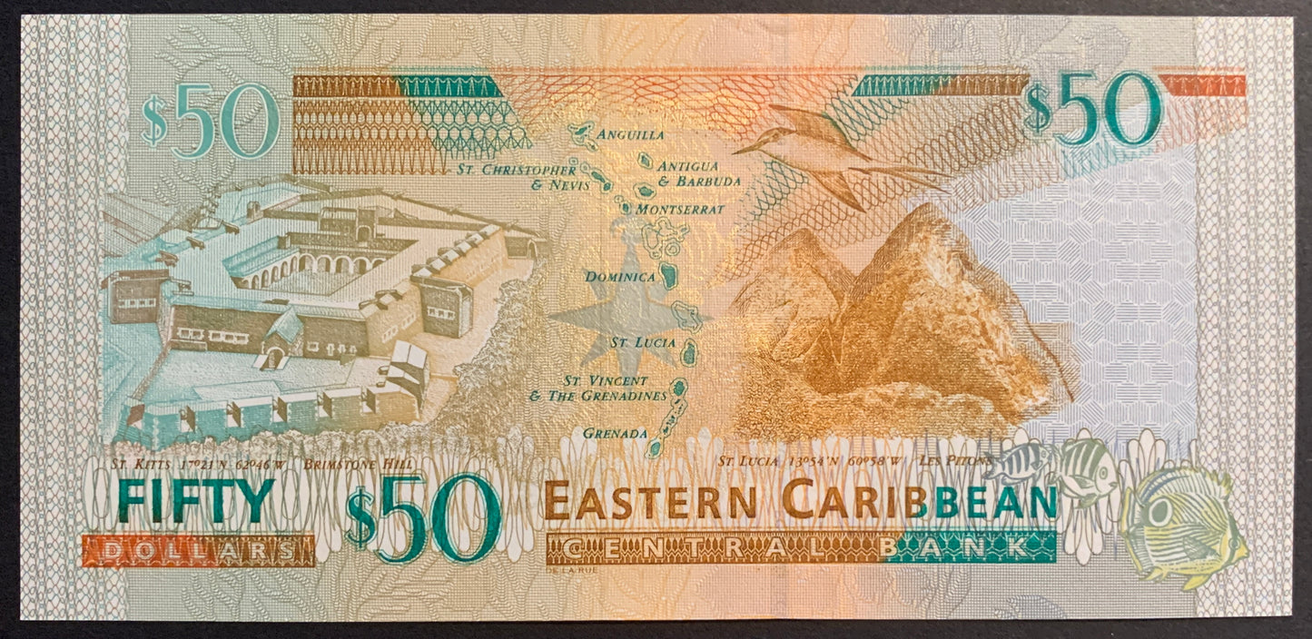 Eastern Caribbean States 50 Dollars ND (2003) P-45v UNC banknote with hummingbird, fish, map of the caribbeans Brimstone Hill in St. Kitts, and Les Pitons Vulcano in St. Lucia