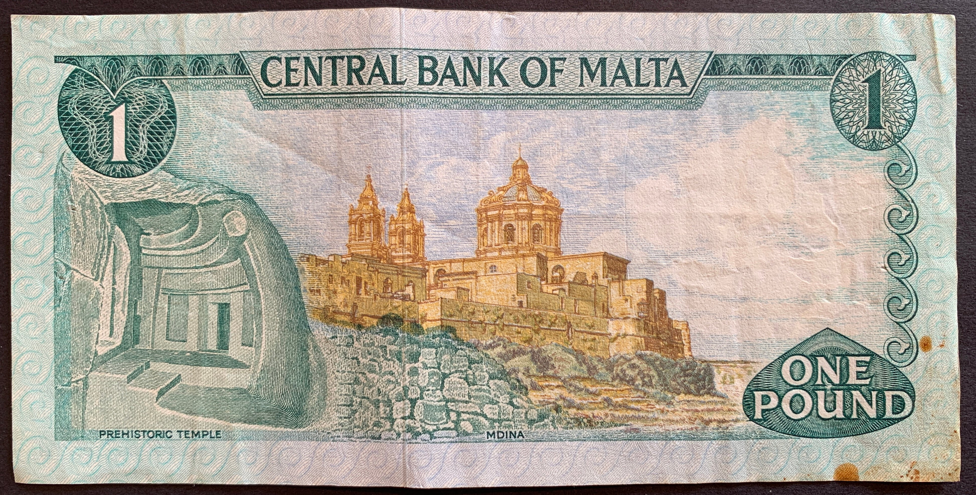 Malta 1 Lira ND (1973) P-31b banknote with prehistoric temple in Mdina