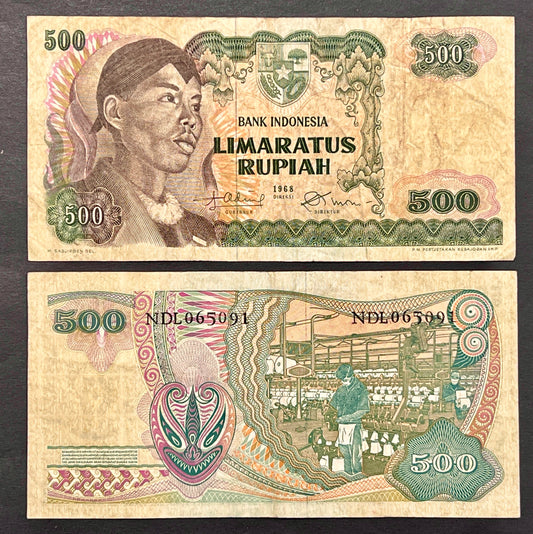 Front view of a vintage 1968 Indonesia 500 Rupiah banknote featuring a portrait of General Sudirman wearing a traditional headdress and the national emblem.