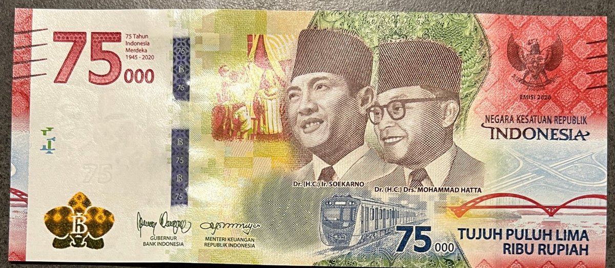 Front view of an uncirculated 2020 Indonesia 75000 Rupiah banknote featuring Soekarno and Mohammad Hatta with the Jakarta MRT and Youtefa Bridge.