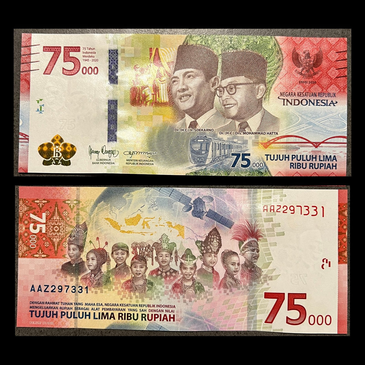 Indonesia 75000 Rupiah 2020 P-161 UNC banknote – front with Soekarno and Mohammad Hatta, back with children in traditional costume and the Merah Putih satellite