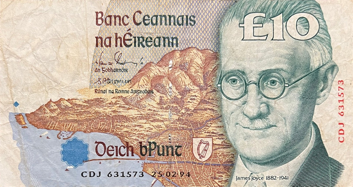 Front view of a very fine 1994 Ireland 10 Pounds banknote featuring writer James Joyce and a view of Dublin Bay.