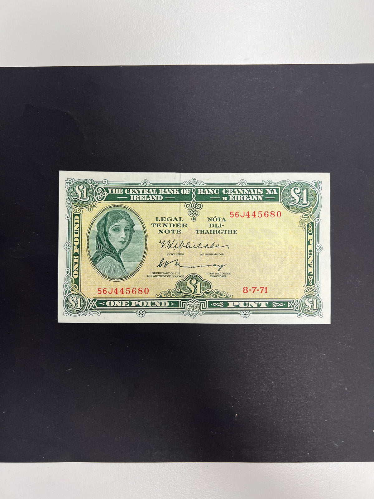 Original unedited photo of the front of an Ireland 1 Pound 1971 P-64c VF banknote